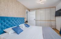 Łóżko lub łóżka w pokoju w obiekcie Villa Njivice Apartment Ema