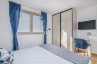 Łóżko lub łóżka w pokoju w obiekcie Villa Njivice Apartment Ema