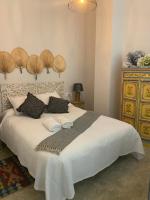 Posteľ alebo postele v izbe v ubytovaní Apartamento Alma Sevilla