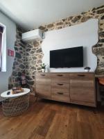 A television and/or entertainment centre at CASTRO - LA COLINA