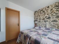 A bed or beds in a room at CASTRO - LA COLINA
