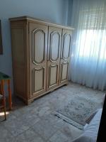 A bed or beds in a room at Villa Paulette