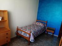 A bed or beds in a room at Villa Paulette