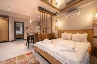 Postel nebo postele na pokoji v ubytování Reddoors Suites Sea View