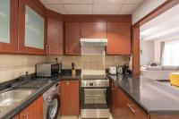 Kuchyň nebo kuchyňský kout v ubytování HiGuests - Stylish Apartment in JBR Steps From the Beach