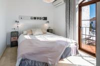 Postel nebo postele na pokoji v ubytování Villa Caroline