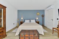 Posteľ alebo postele v izbe v ubytovaní Modern Rustic Villa Kate