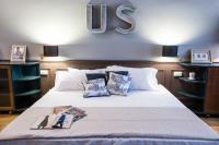 A bed or beds in a room at Soprarno Suites