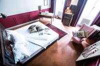 A bed or beds in a room at Soprarno Suites