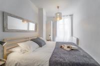 Postel nebo postele na pokoji v ubytování Residencial Villa Margarita