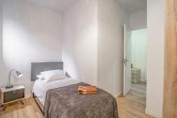 Postel nebo postele na pokoji v ubytování Residencial Villa Margarita