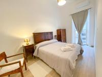 A bed or beds in a room at Le Casette di Piazza Borsa