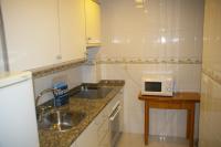 A kitchen or kitchenette at Apartamento Princicasim 2 dormitorios