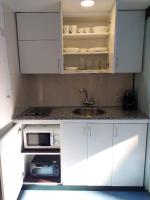 Kuchyňa alebo kuchynka v ubytovaní APARTAMENTO con TERRAZA VISTAS AL MAR