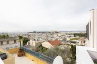 Nespecifikovaný výhled na destinaci Atény nebo výhled na město při pohledu z apartmánu