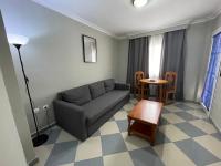 Posedenie v ubytovaní Apartamentos Niña de Oro
