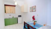 Kuchyň nebo kuchyňský kout v ubytování Keti Apartments