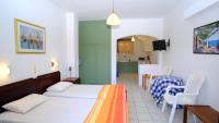Postel nebo postele na pokoji v ubytování Keti Apartments