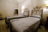 Posteľ alebo postele v izbe v ubytovaní la Casa di Francesco e Rosina