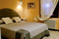 Posteľ alebo postele v izbe v ubytovaní la Casa di Francesco e Rosina