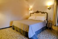 Posteľ alebo postele v izbe v ubytovaní la Casa di Francesco e Rosina