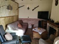 Zona de estar de Estudio Rustico