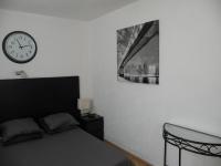Cama o camas de una habitaci&oacute;n en Charmant Studio &agrave; Belfort quartier Vosges