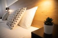 A bed or beds in a room at Apartamento Ayuntamiento Av de La Paz