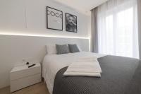 A bed or beds in a room at Apartamento Ayuntamiento Av de La Paz