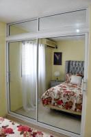 Postel nebo postele na pokoji v ubytování Acogedor Espacio en Santo Domingo Este.