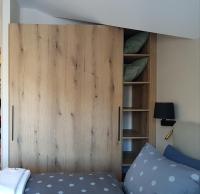 Postel nebo postele na pokoji v ubytování PinePino Borovets, aparthotel Borovets Gardens A60