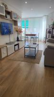 TV a/nebo společenská místnost v ubytování BENIDORM PLAYA LEVANTE