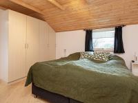 Postel nebo postele na pokoji v ubytování Holiday home Væggerløse LXXI