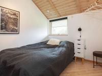 Postel nebo postele na pokoji v ubytování Holiday home Væggerløse LXXI
