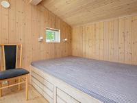 Postel nebo postele na pokoji v ubytování 10 person holiday home in Idestrup