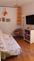 A bed or beds in a room at Casetta Belvedere - Santa Fiora
