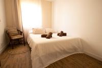 Łóżko lub łóżka w pokoju w obiekcie Marea Fuerteventura Home 2