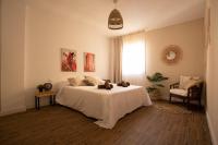 Łóżko lub łóżka w pokoju w obiekcie Marea Fuerteventura Home 2