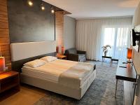 Posteľ alebo postele v izbe v ubytovaní Green Garden Hotel