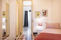 A bed or beds in a room at Casa Rorro' nei pressi di Via Roma by Wonderful Italy