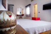 Postel nebo postele na pokoji v ubytování Sanafir Hotel - El Pacha Suites Sharm - Adults Only