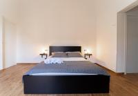 Posteľ alebo postele v izbe v ubytovaní Civico64 apartments