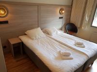 Postel nebo postele na pokoji v ubytování Hotell Stinsen