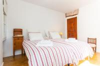 Łóżko lub łóżka w pokoju w obiekcie Preciosa Casa Ca Madò Maria con vistas a Bunyola