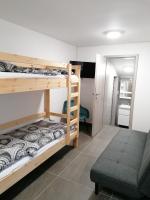 Chaty a Apartmány Hracholusky Kemp Kosatkaにあるベッド