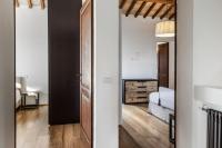 Łóżko lub łóżka w pokoju w obiekcie Villa Chiugi by PosarelliVillas