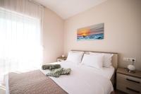 Posteľ alebo postele v izbe v ubytovaní Apartments Anka with Seaview