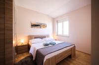 Posteľ alebo postele v izbe v ubytovaní Apartments Anka with Seaview