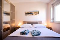 Posteľ alebo postele v izbe v ubytovaní Apartments Anka with Seaview