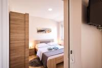 Posteľ alebo postele v izbe v ubytovaní Apartments Anka with Seaview